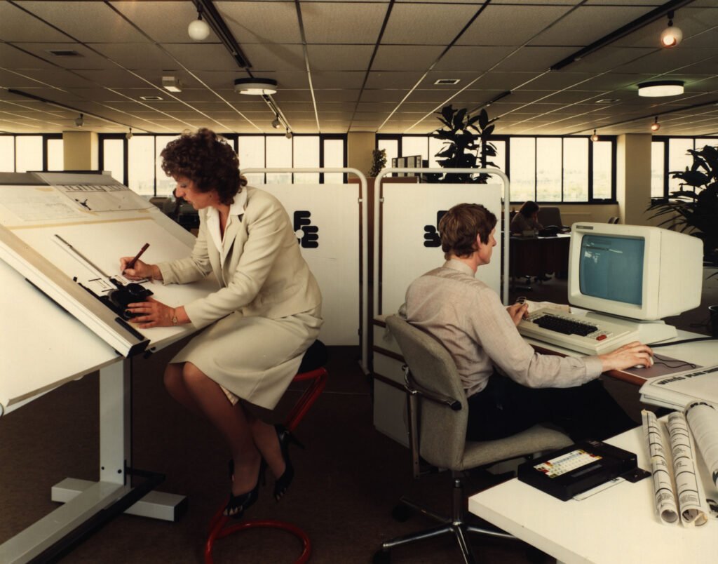 Office workers at computer desks
