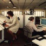 Office workers at computer desks