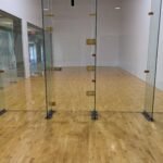 An indoor racquet sport court