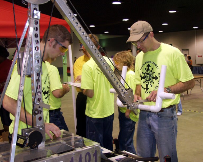 Students competing in a school robotics competition